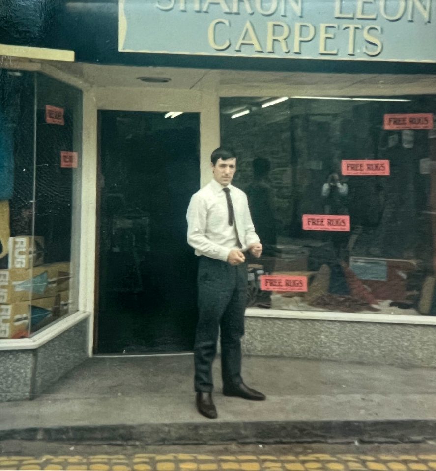 Owner James Sheerin in front of his Elgin shop 1975