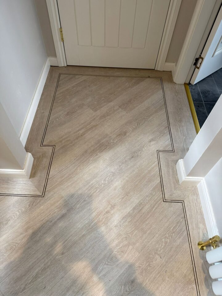 Elegant Amtico Form Cowrie Oak with an intricate 3foot Lotus Motif 01